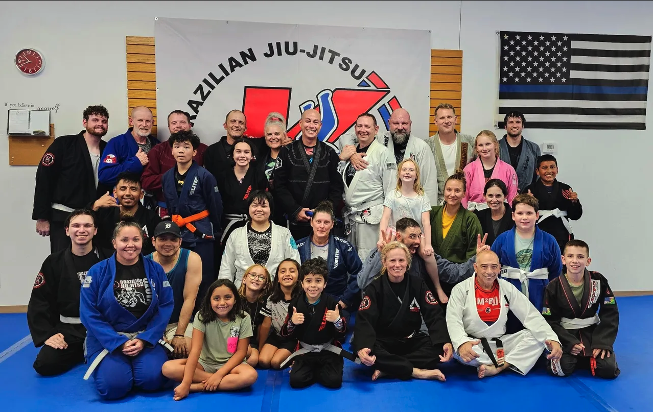 Kioto BJJ Southwest Arizona — full school group photo on the mat