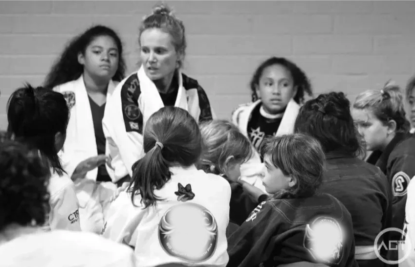 Professor Liz Lutrario coaching the youth program